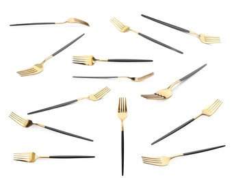 Shiny golden forks isolated on white, set