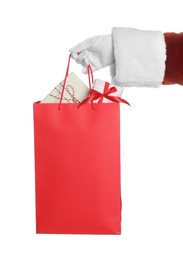 Santa holding paper bag with gift boxes on white background, closeup