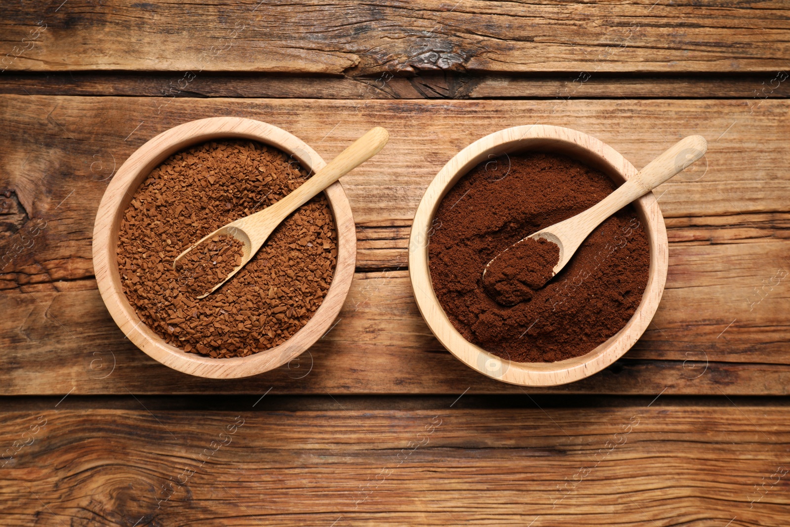 Photo of Instant and ground coffee on wooden table, flat lay