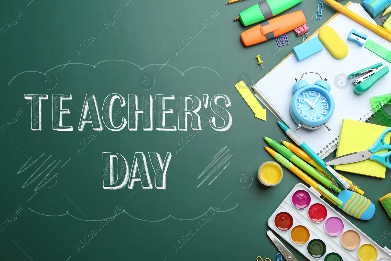 Image of Text Teacher's Day and different school stationery on green chalkboard, flat lay. Greeting card design