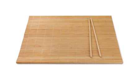 Photo of Bamboo mat and chopsticks isolated on white