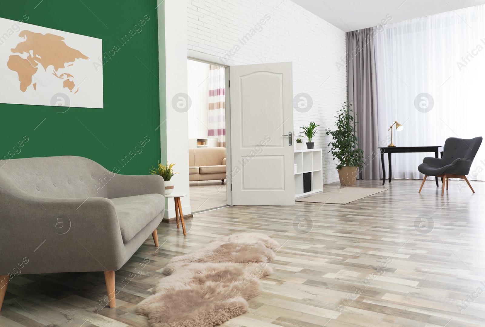 Photo of Living room interior with stylish furniture and open door