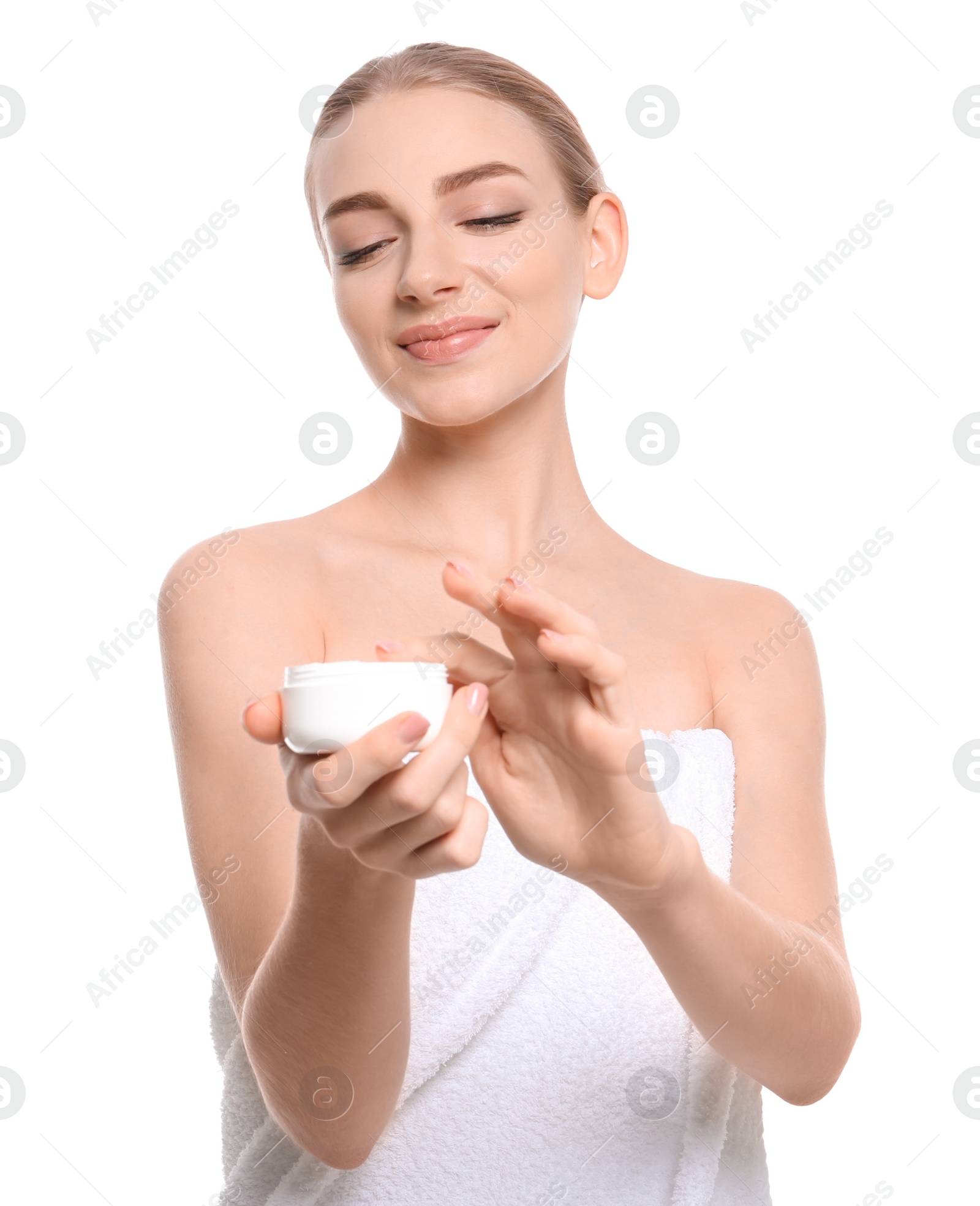 Photo of Young woman with jar of body cream on white background