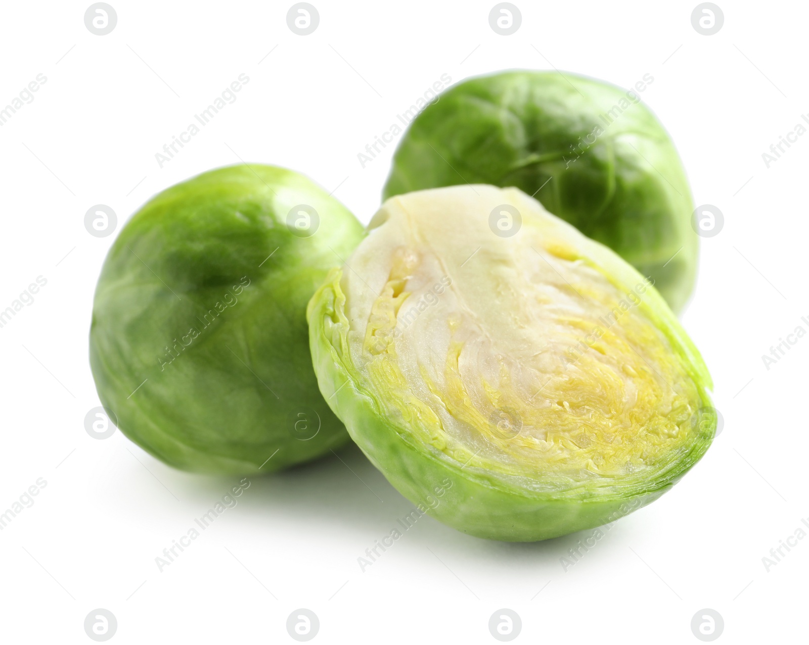 Photo of Fresh tasty Brussels sprouts on white background