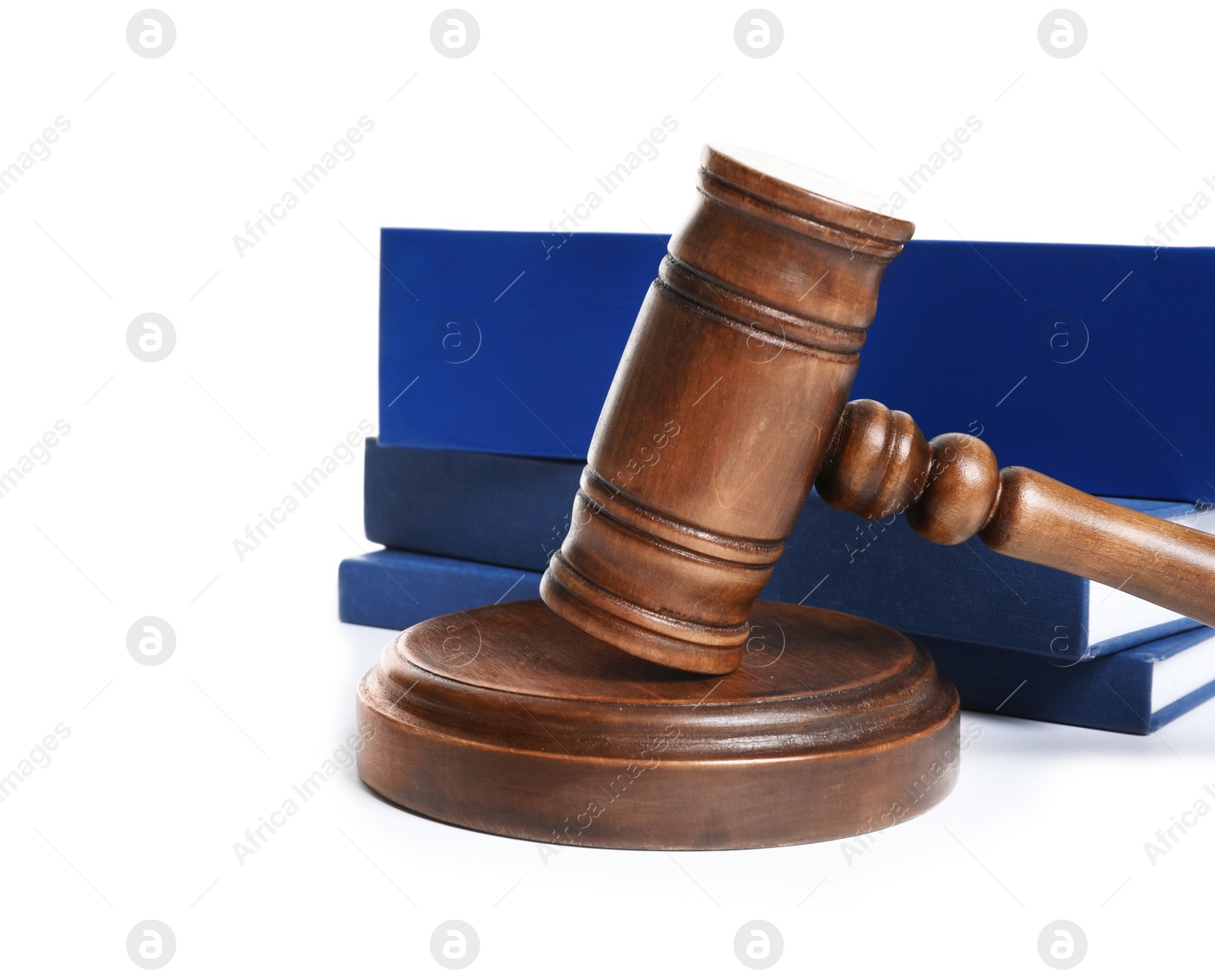 Photo of Wooden gavel and books on white background. Law concept