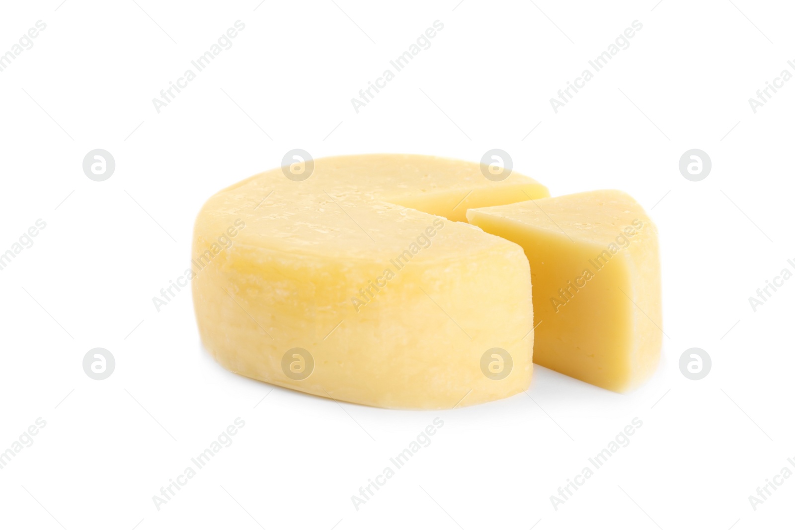 Photo of Cut fresh delicious cheese isolated on white