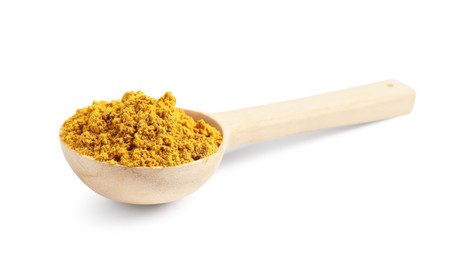 Spoon with dry curry powder isolated on white