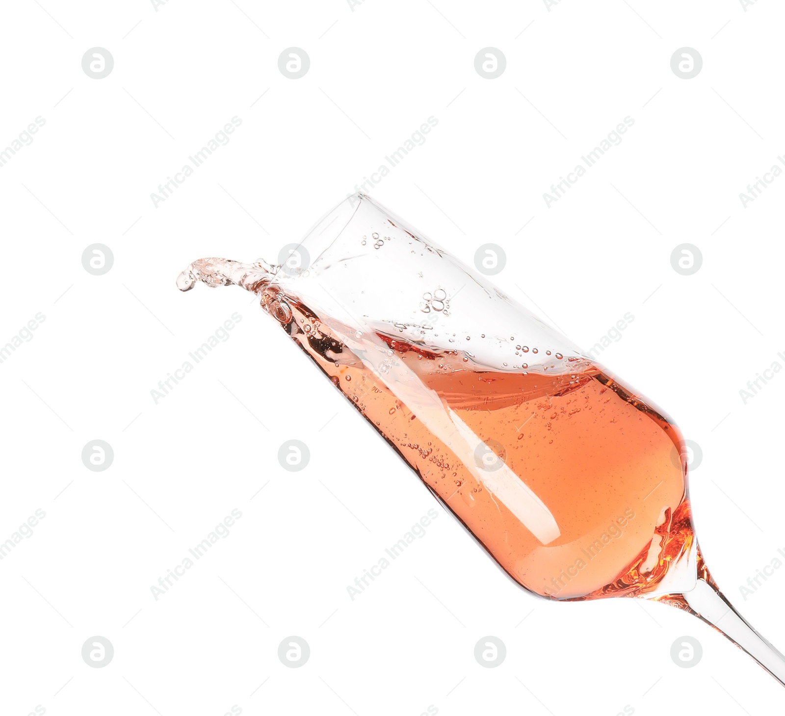 Photo of Glass of rose champagne isolated on white