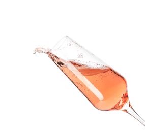 Photo of Glass of rose champagne isolated on white