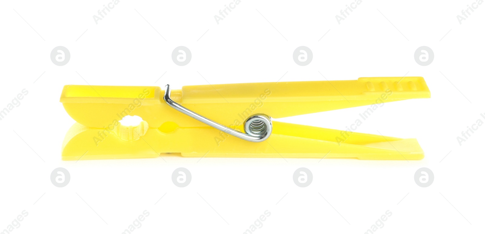 Photo of Bright yellow plastic clothespin isolated on white