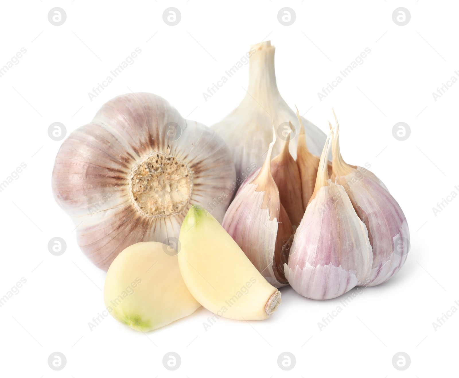 Photo of Fresh garlic bulbs and cloves isolated on white. Organic food
