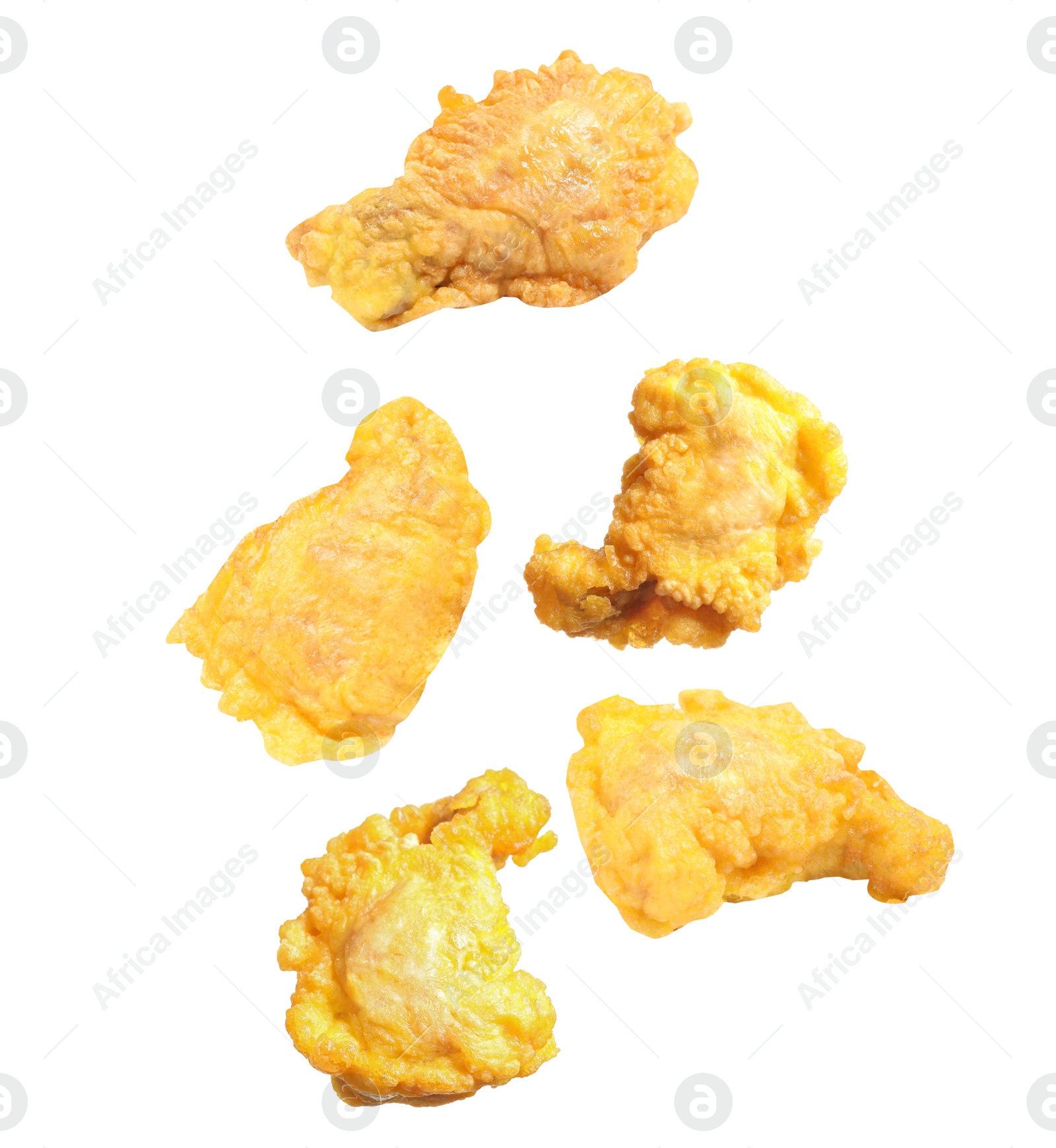 Image of Fresh fried chicken falling on white background