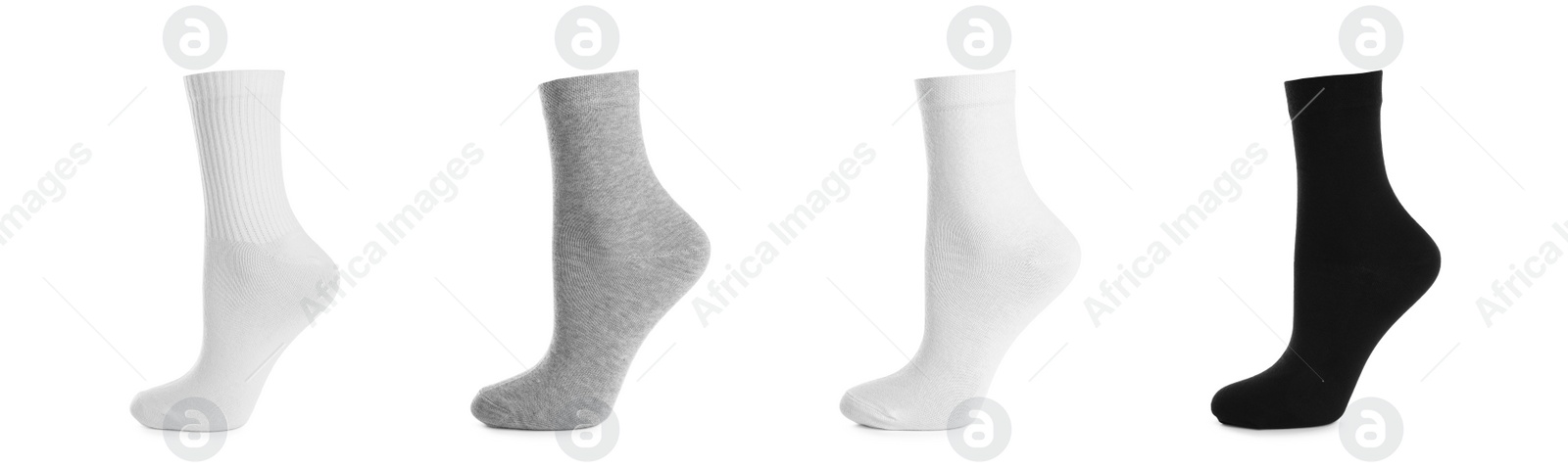 Image of Set with different socks on white background. Banner design