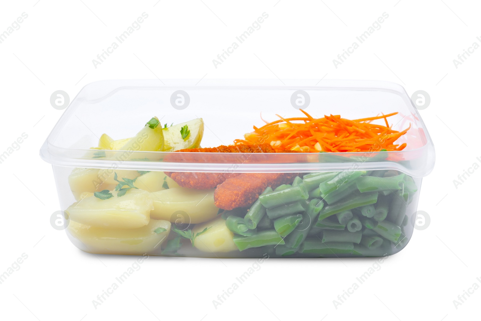 Photo of Tasty potatoes with cutlets and vegetables in plastic container isolated on white