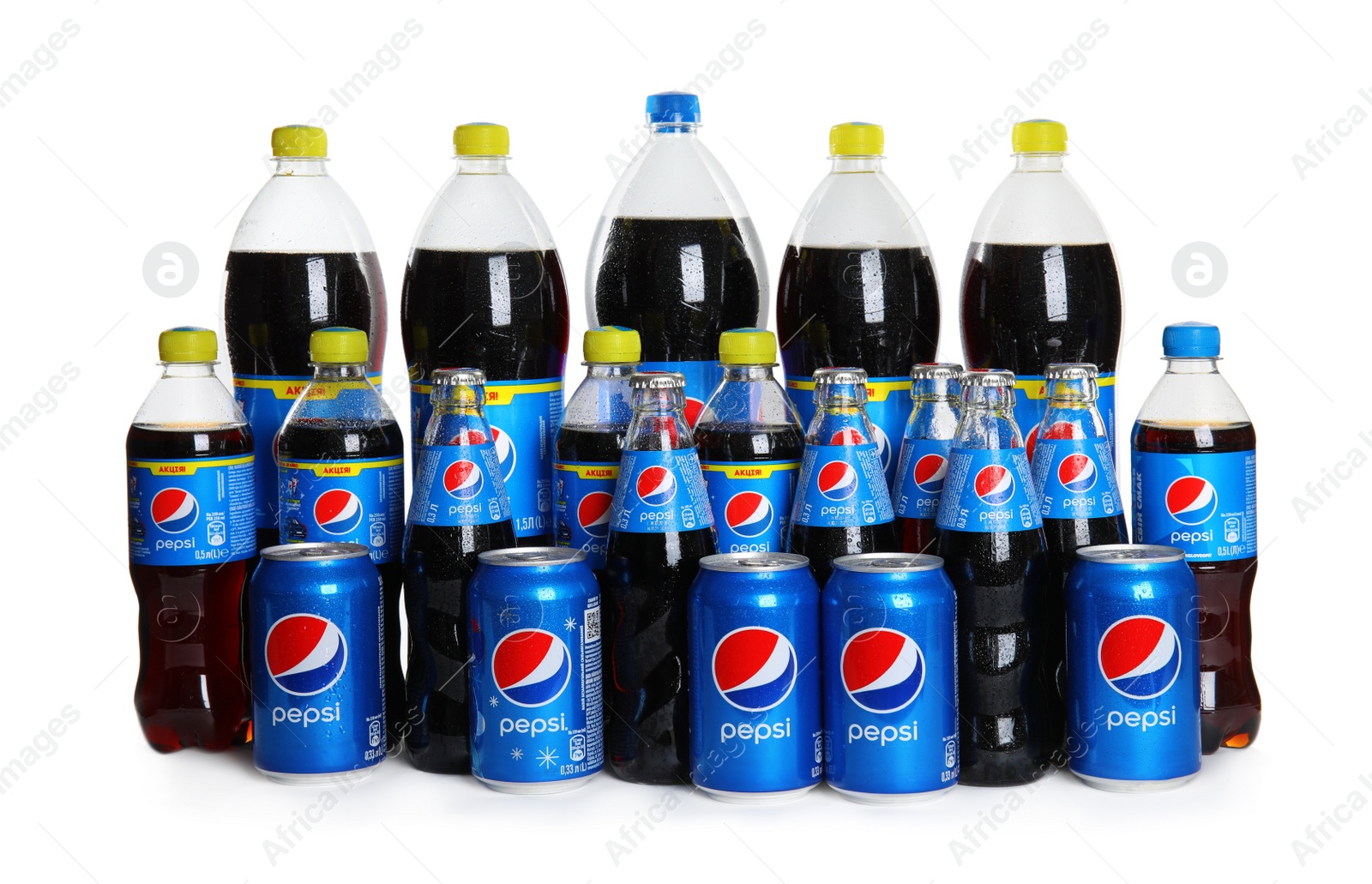 Photo of MYKOLAIV, UKRAINE - FEBRUARY 10, 2021: Different bottles and cans of Pepsi on white background