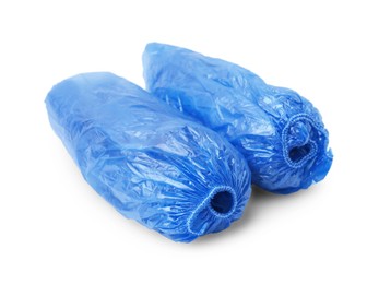 Rolled blue shoe covers isolated on white