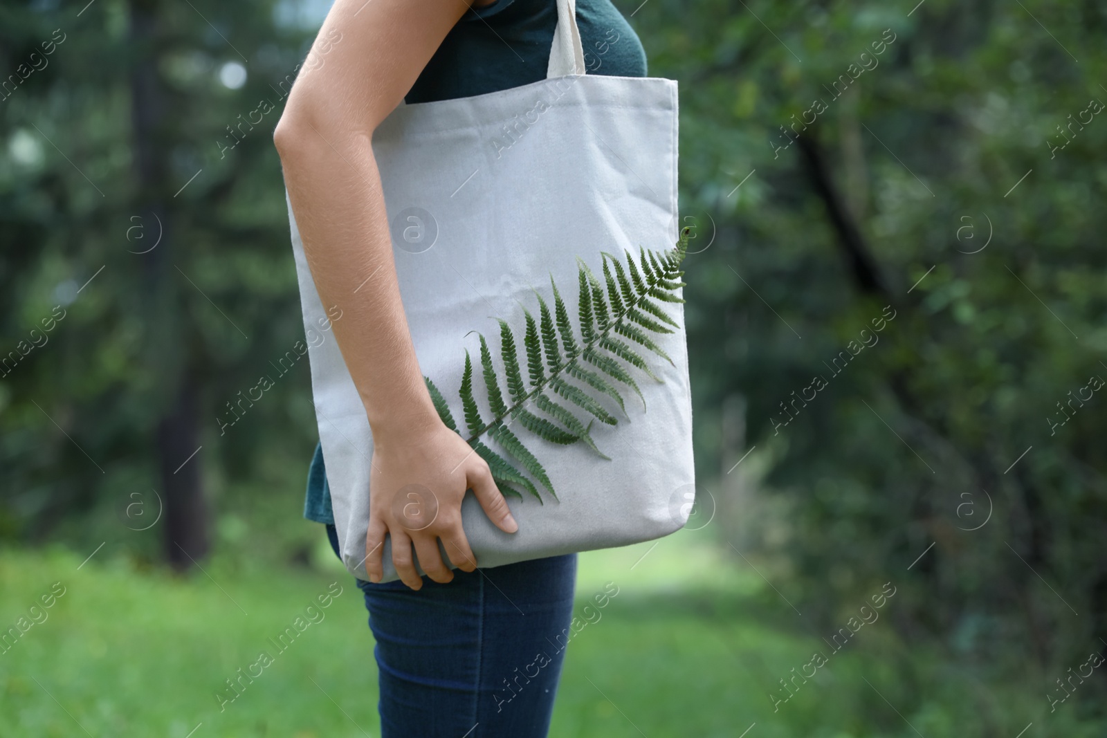 Photo of Woman with eco bag outdoors. Mockup for design