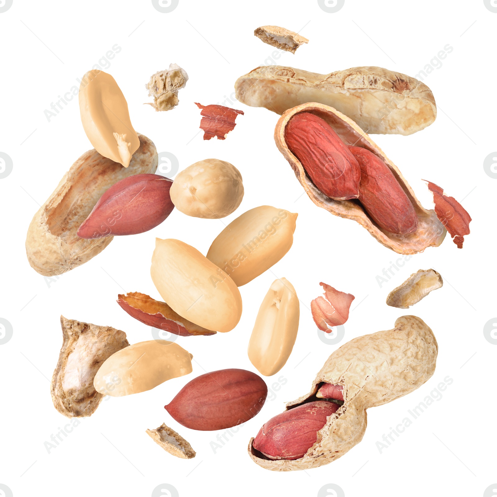 Image of Peanuts and crushed pods in air on white background