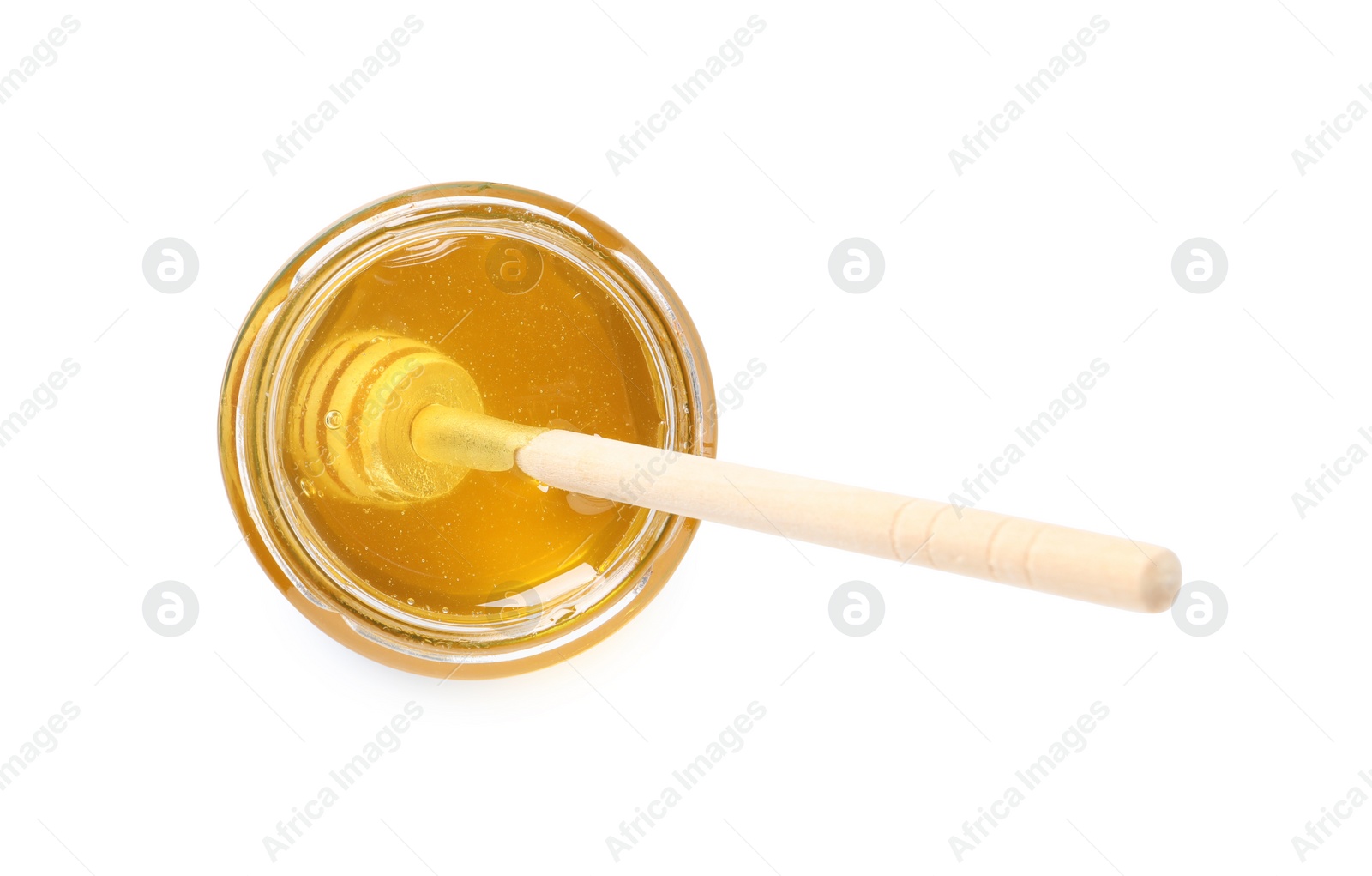 Photo of Tasty honey and dipper in glass jar isolated on white, top view