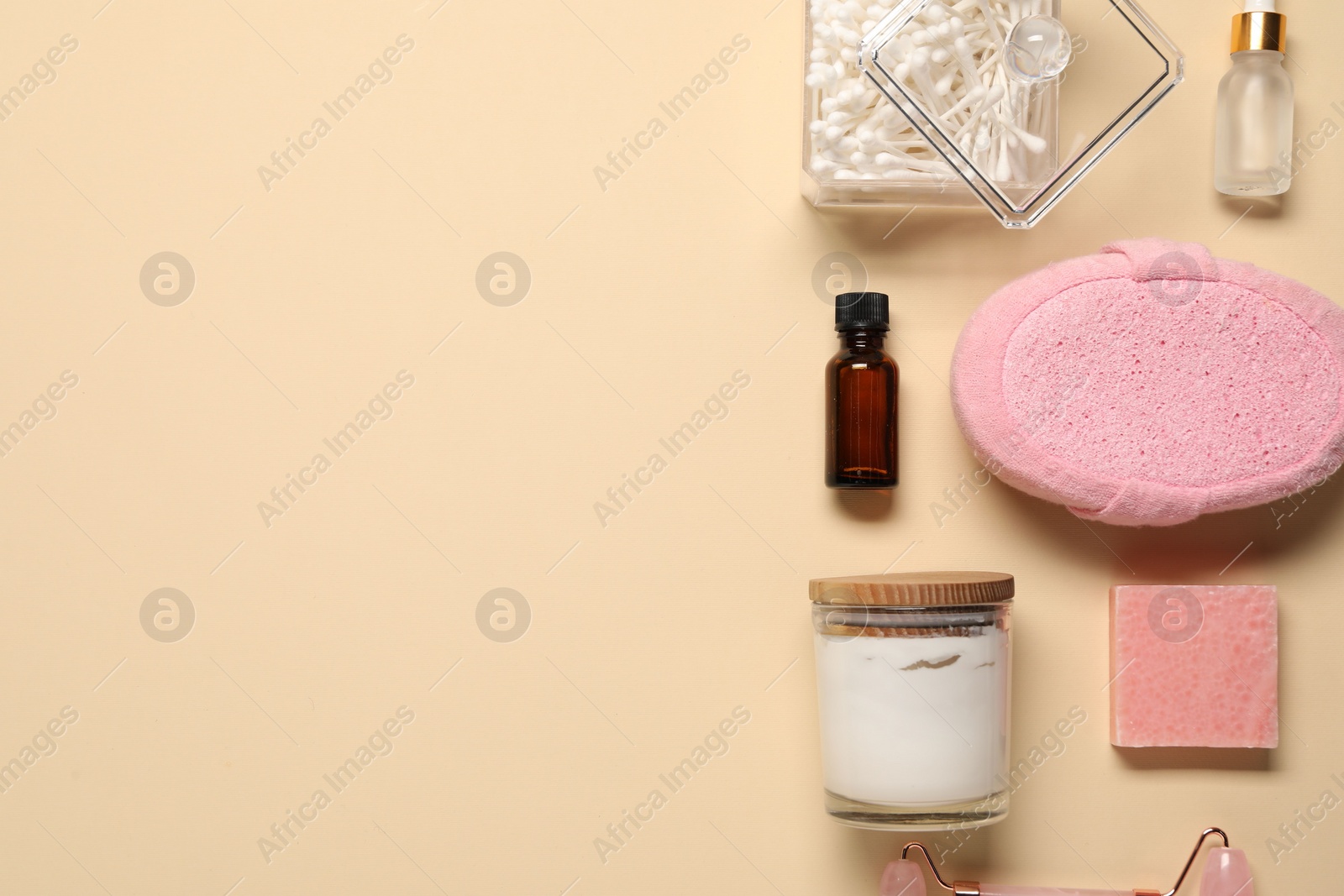 Photo of Bath accessories. Flat lay composition with personal care products on beige background, space for text