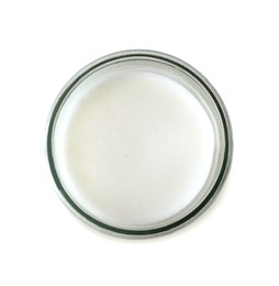 Photo of Glass of fresh milk isolated on white, top view