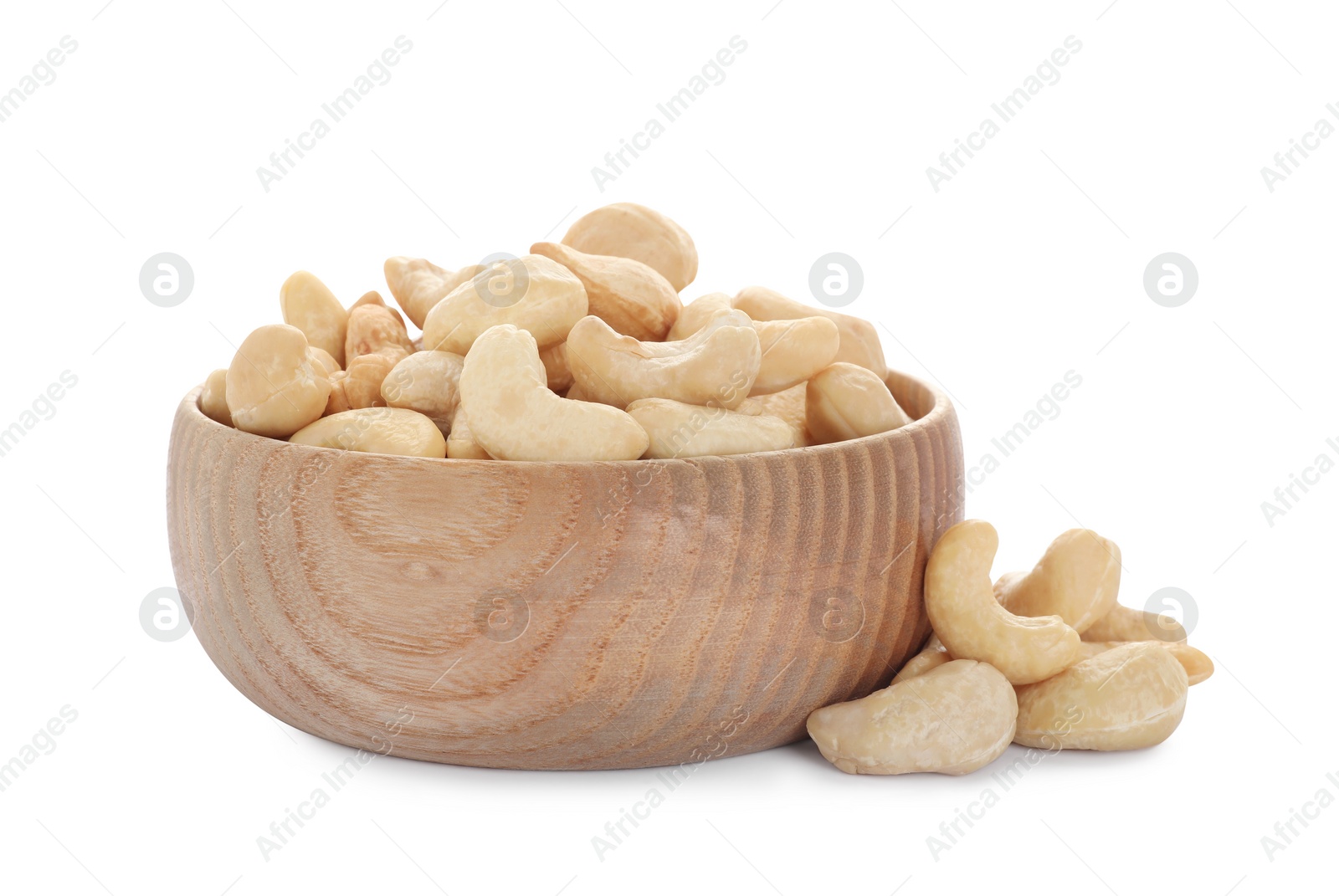 Photo of Bowl and tasty organic cashew nuts isolated on white