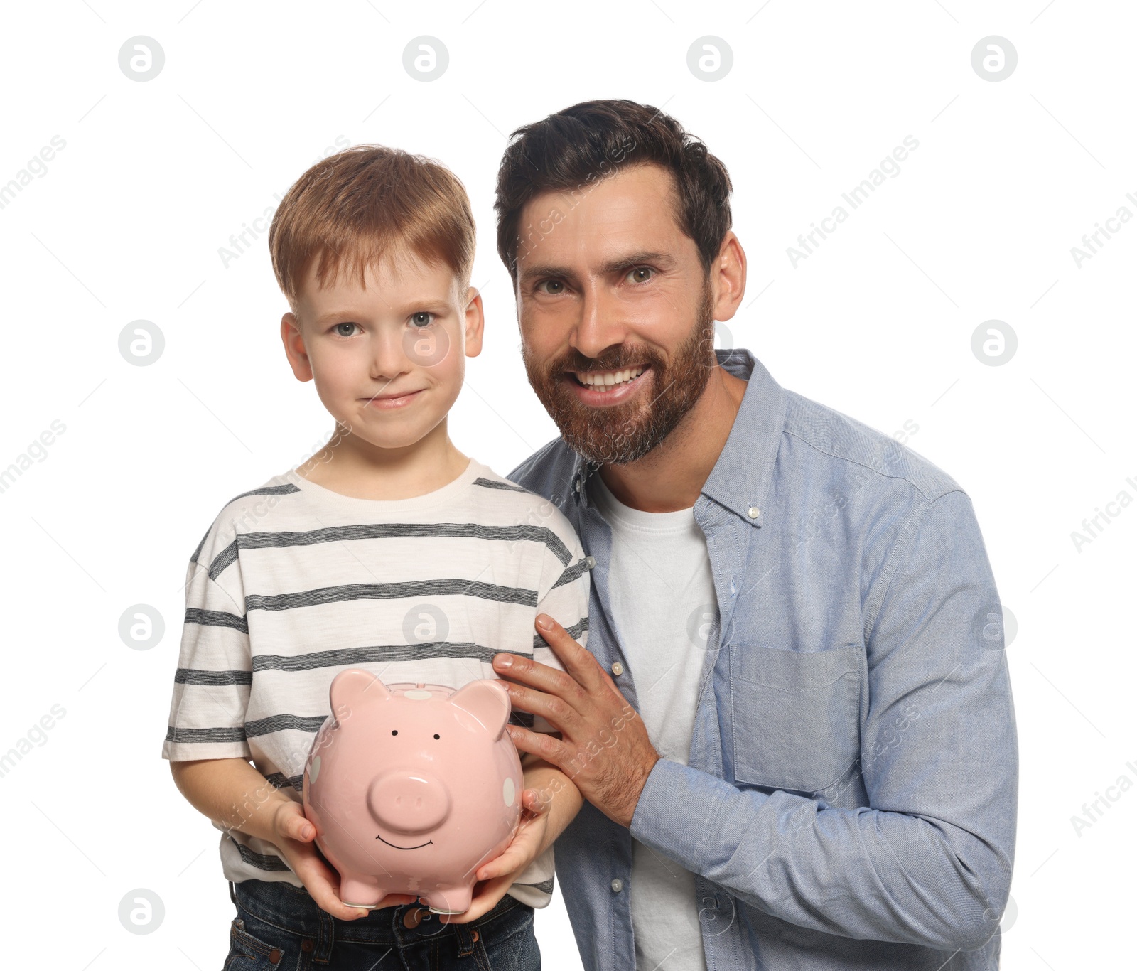 Photo of Father and his son with ceramic piggy bank on white background