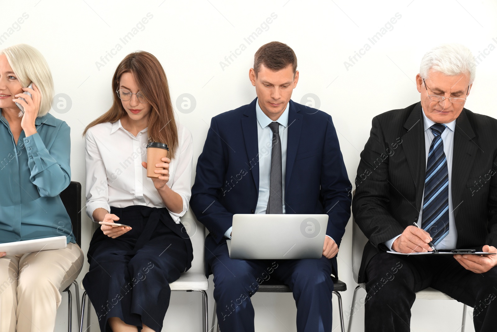 Photo of People waiting for job interview in office