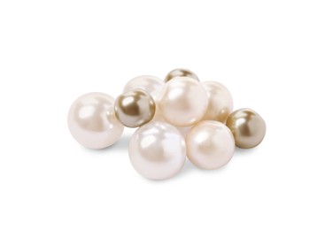 Photo of Many beautiful oyster pearls on white background