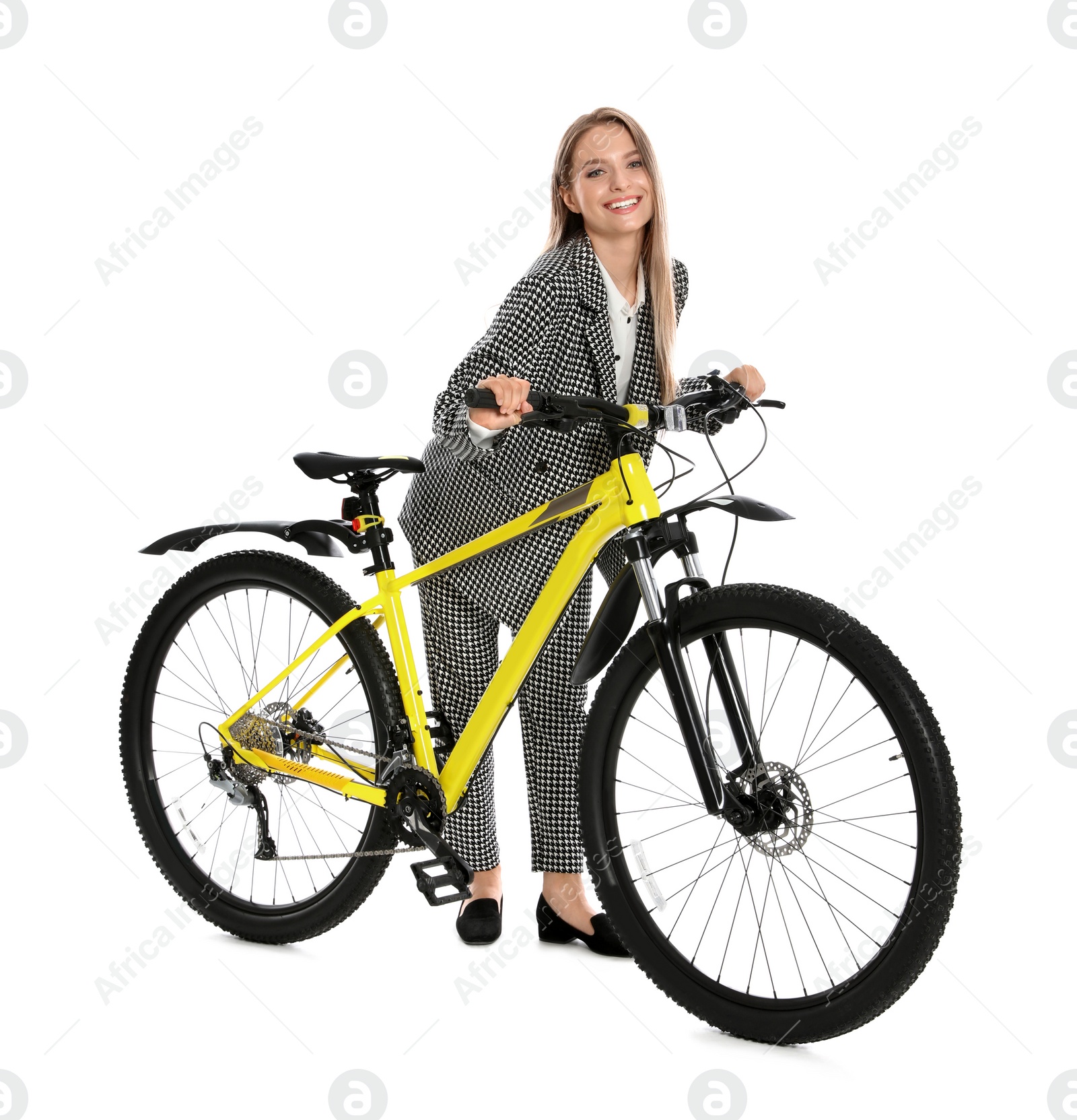 Photo of Young businesswoman with bicycle on white background