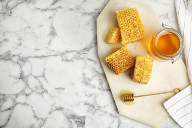 Photo of Flat lay composition with delicious honey on white marble table. Space for text