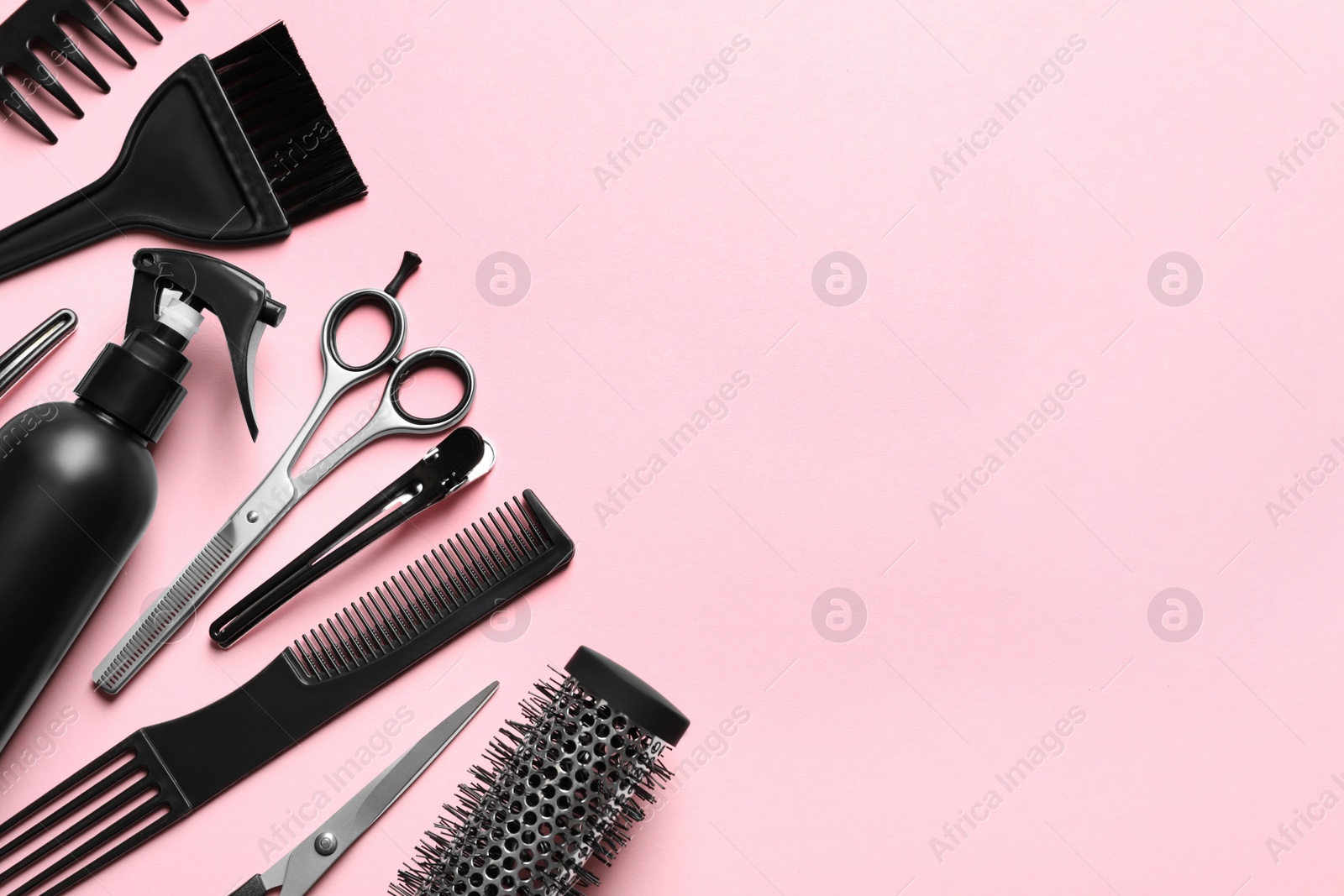 Photo of Professional hairdresser set on color background