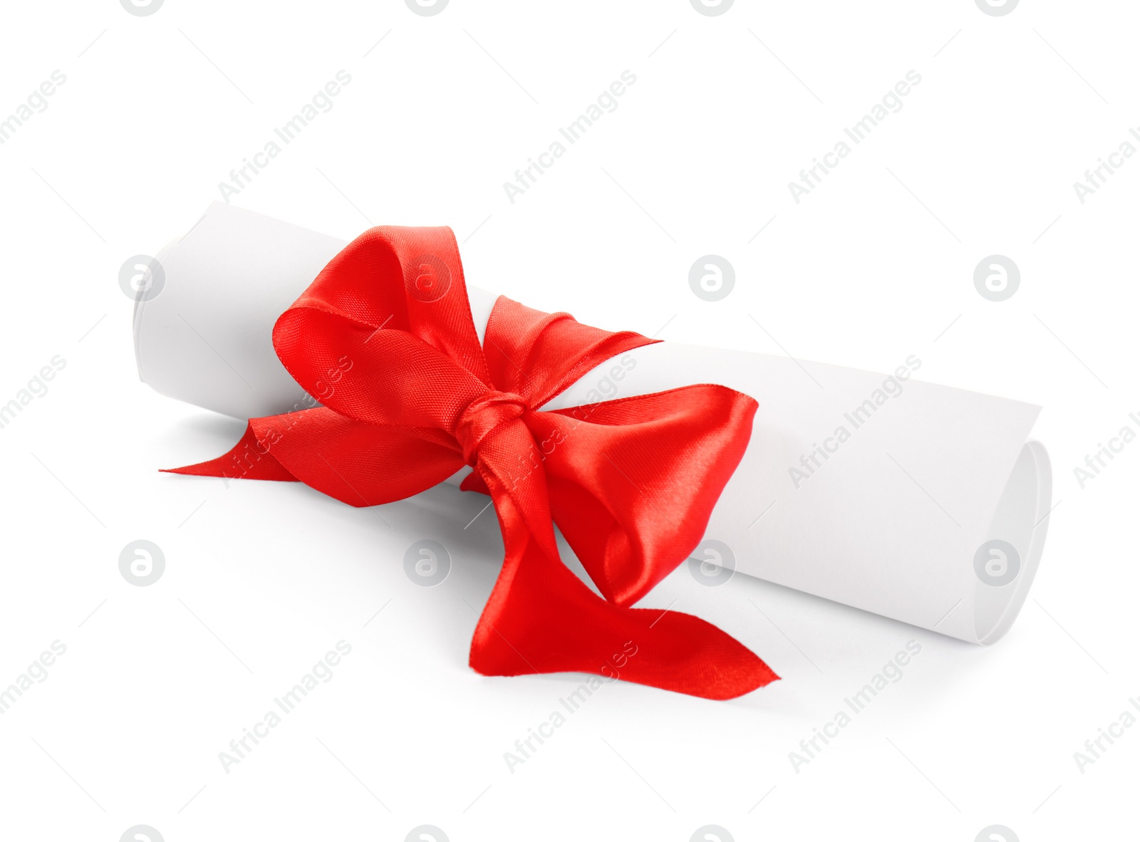 Photo of Rolled student's diploma with red ribbon on white background