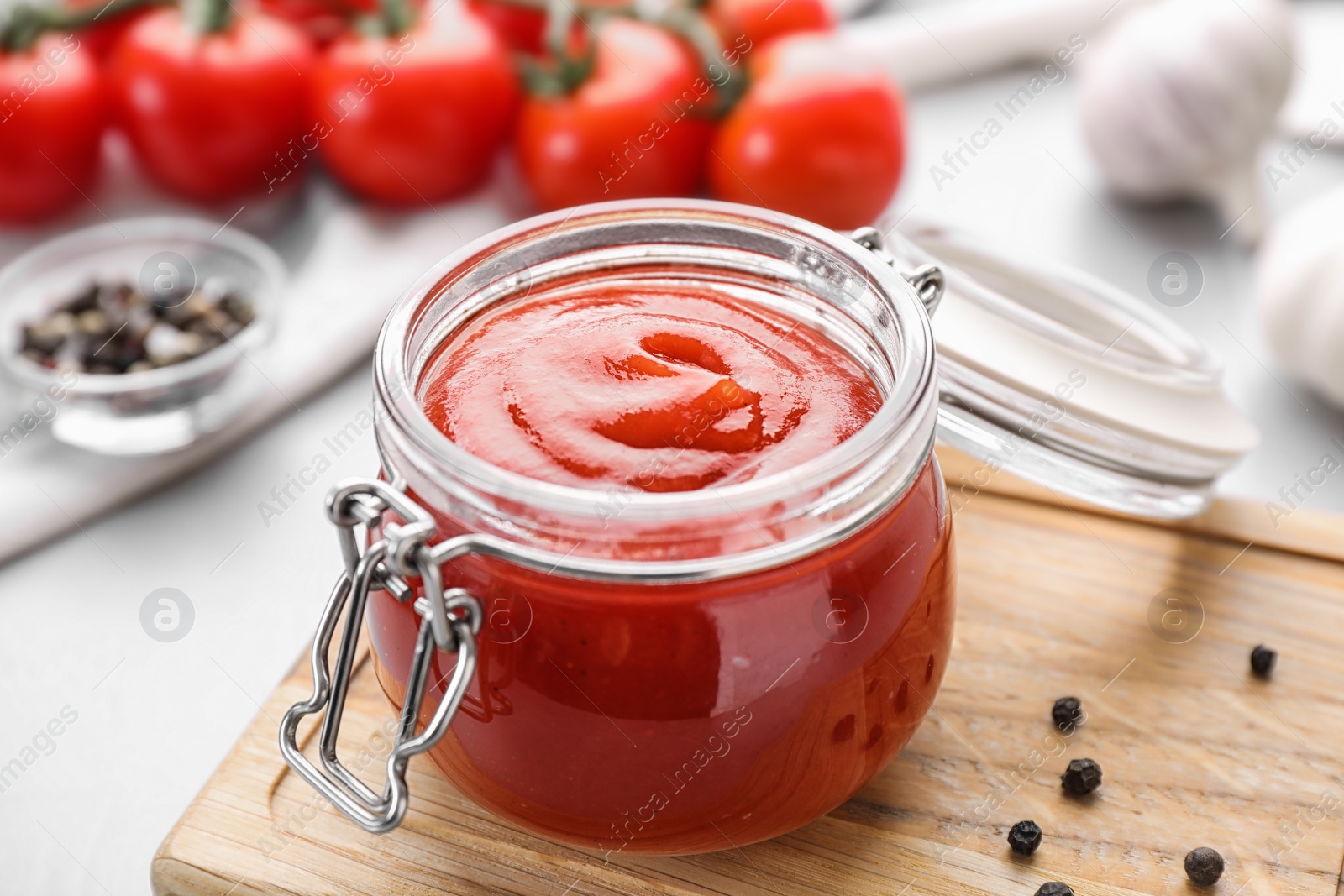 Photo of Delicious fresh tomato sauce on table, closeup