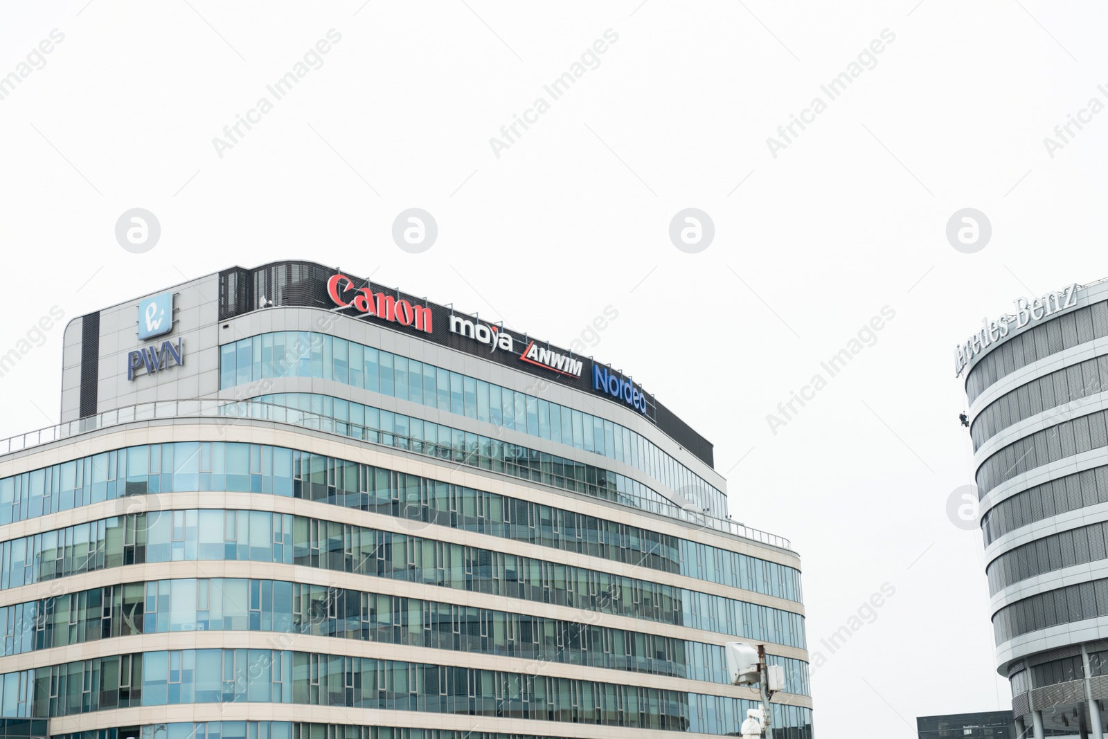 Photo of Warsaw, Poland - September 10, 2022: Buildings with many modern logos