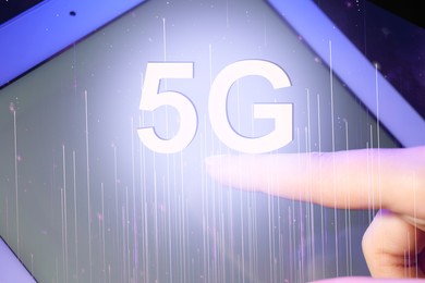 Image of Woman using tablet with 5G network system, closeup