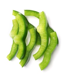 Photo of Pile of green bell pepper slices on white background, top view