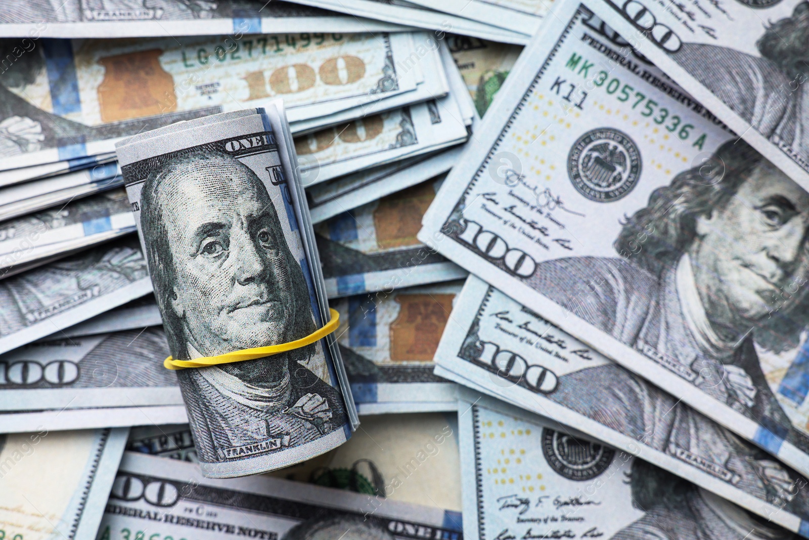 Photo of Dollar banknotes on table, top view. Money exchange