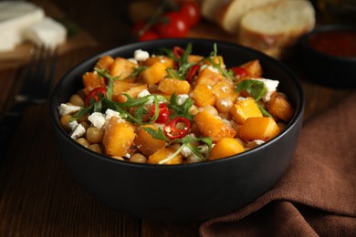 Photo of Delicious fresh chickpea salad served on table