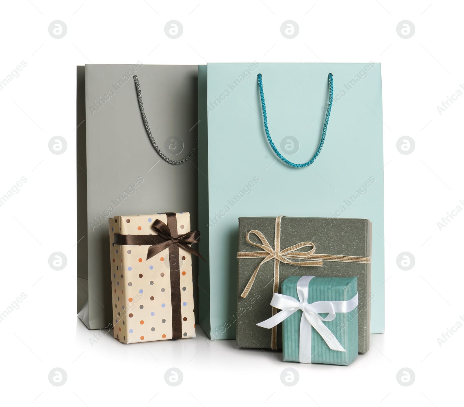 Photo of Paper bags and gift boxes isolated on white