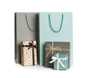 Paper bags and gift boxes isolated on white