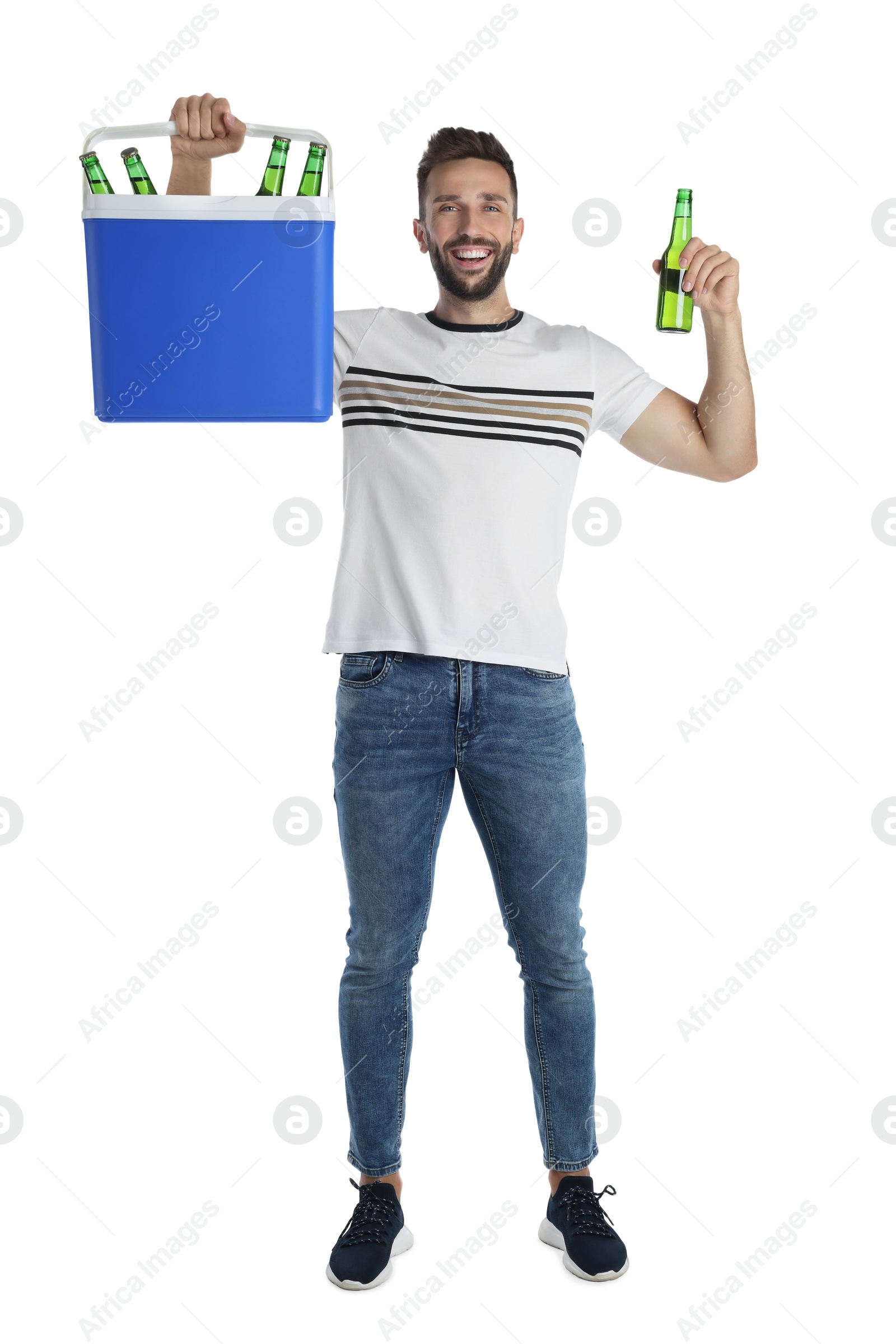 Photo of Happy man with cool box and bottles of beer on white background