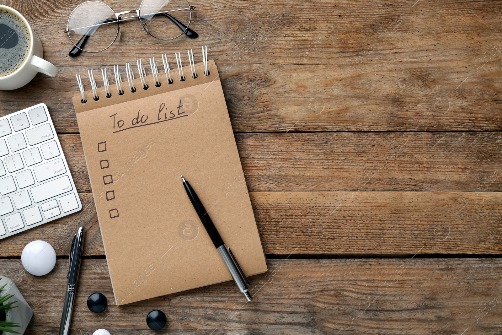 Photo of Flat lay composition with to do list on wooden table, space for text