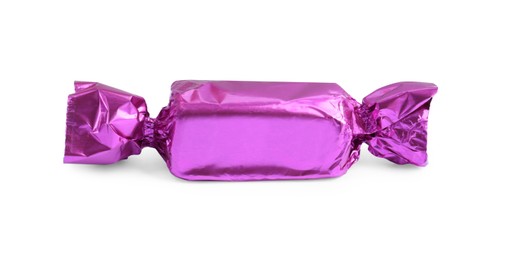 Tasty candy in violet wrapper isolated on white