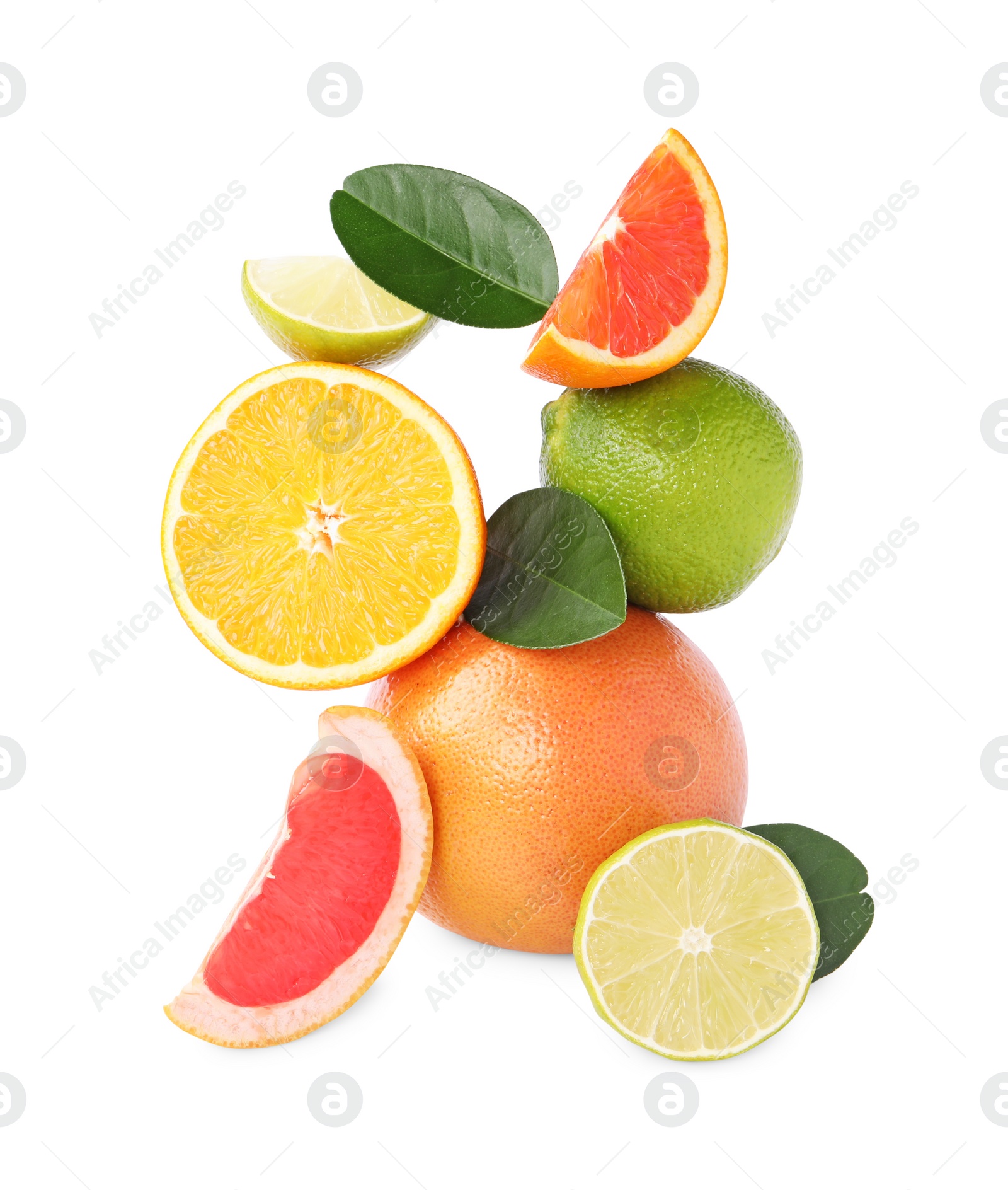 Photo of Fresh ripe citrus fruits and green leaves isolated on white