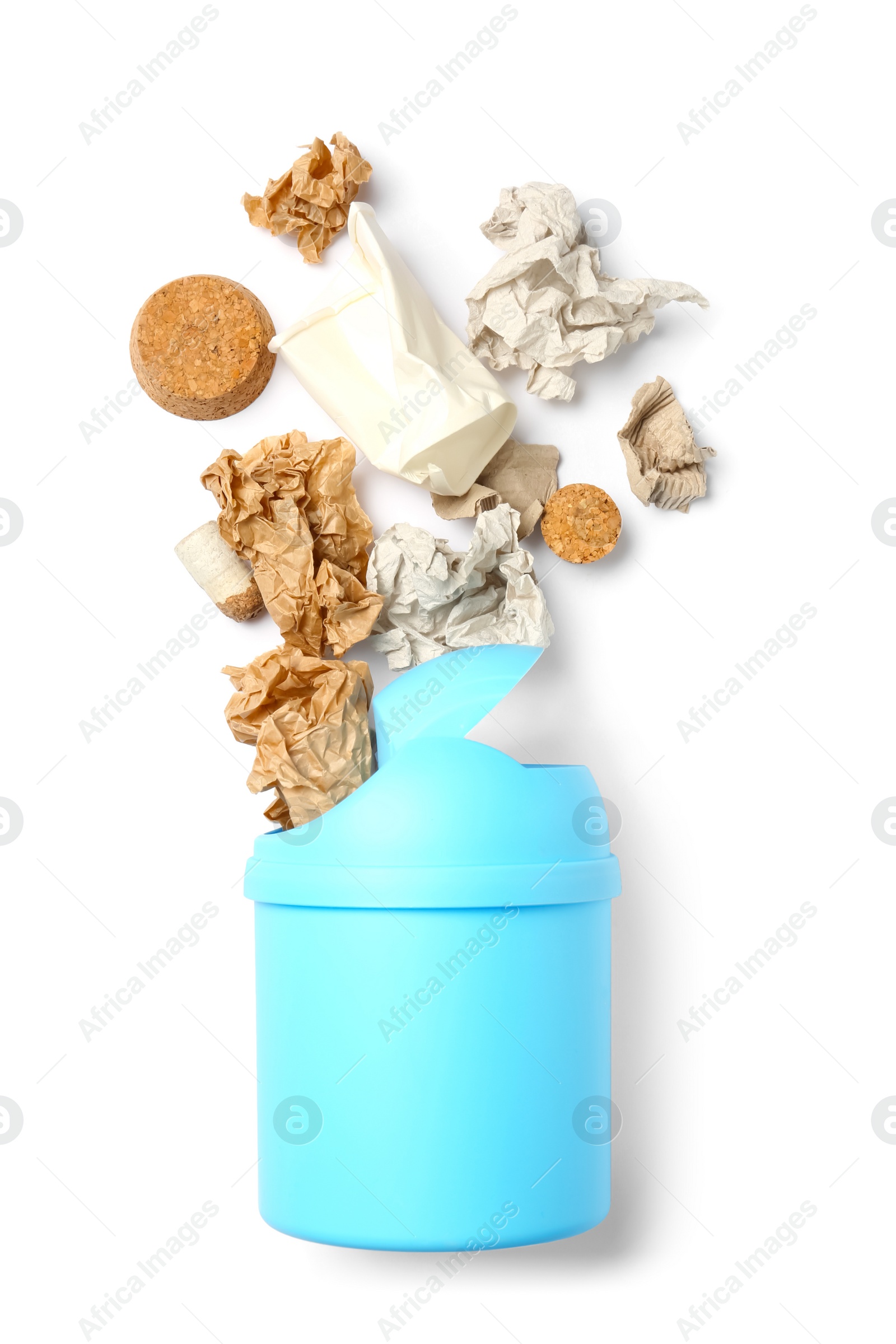 Photo of Trash bin and different garbage isolated on white, top view. Waste recycling concept