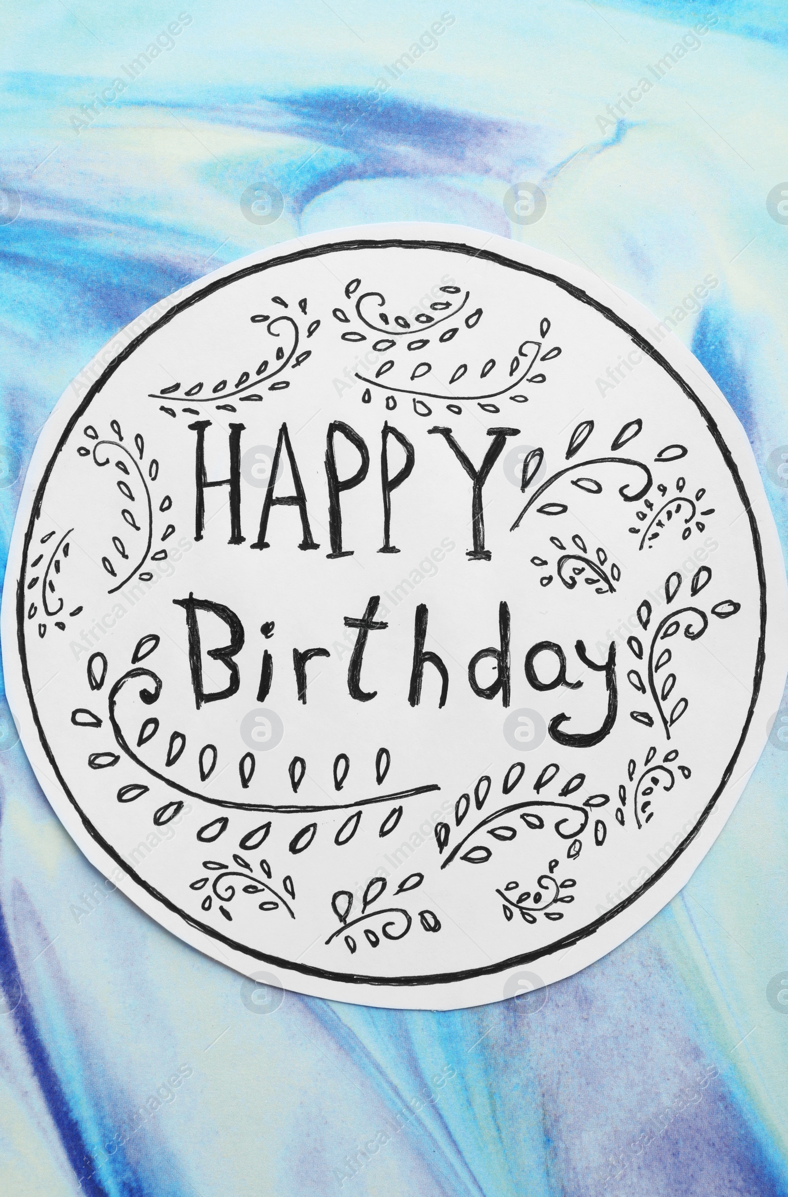 Photo of Card with words HAPPY BIRTHDAY and floral pattern on color background, top view