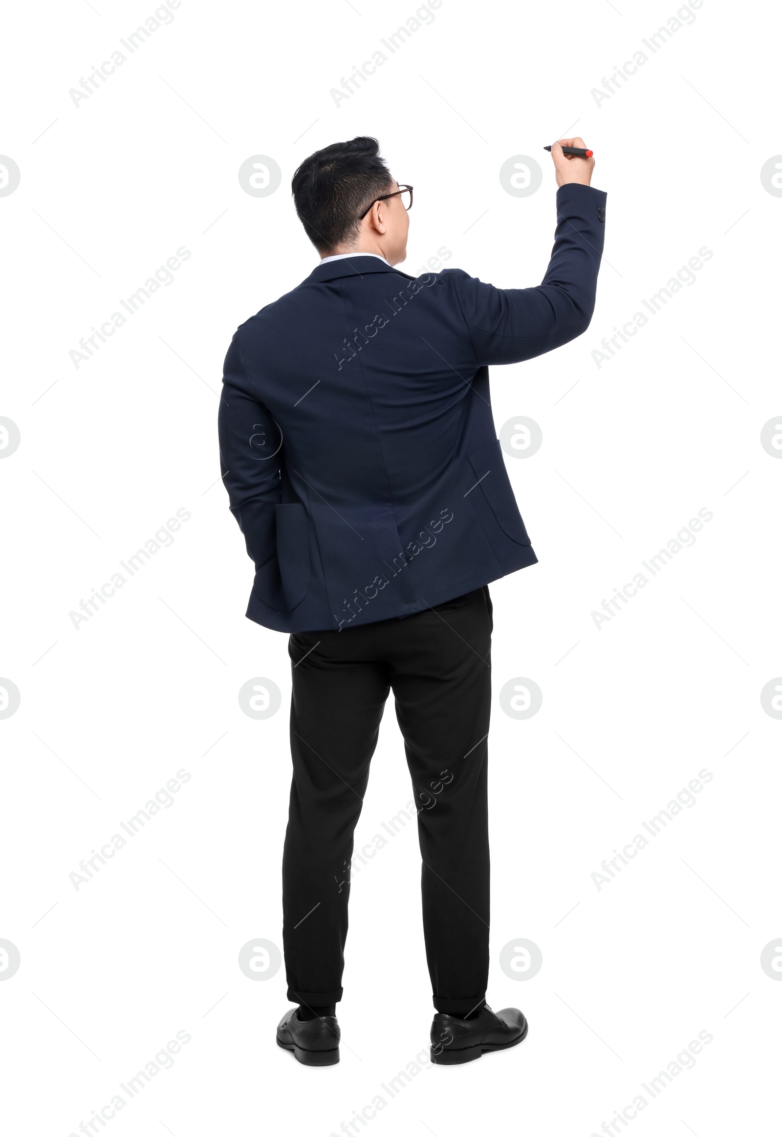 Photo of Businessman in suit with marker writing on white background, back view