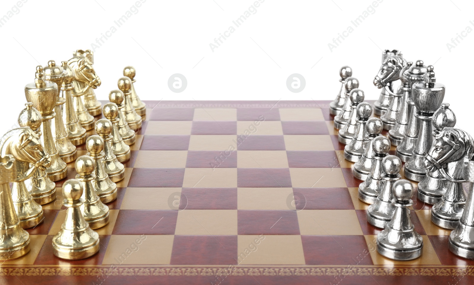 Photo of Chess pieces on wooden board against white background