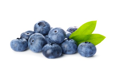 Photo of Pile of tasty fresh ripe blueberries and green leaves on white background